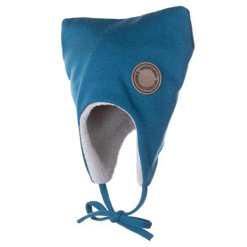 Turquoiseblauwe babymuts van merinowol – houd je kleintje warm in stijl.