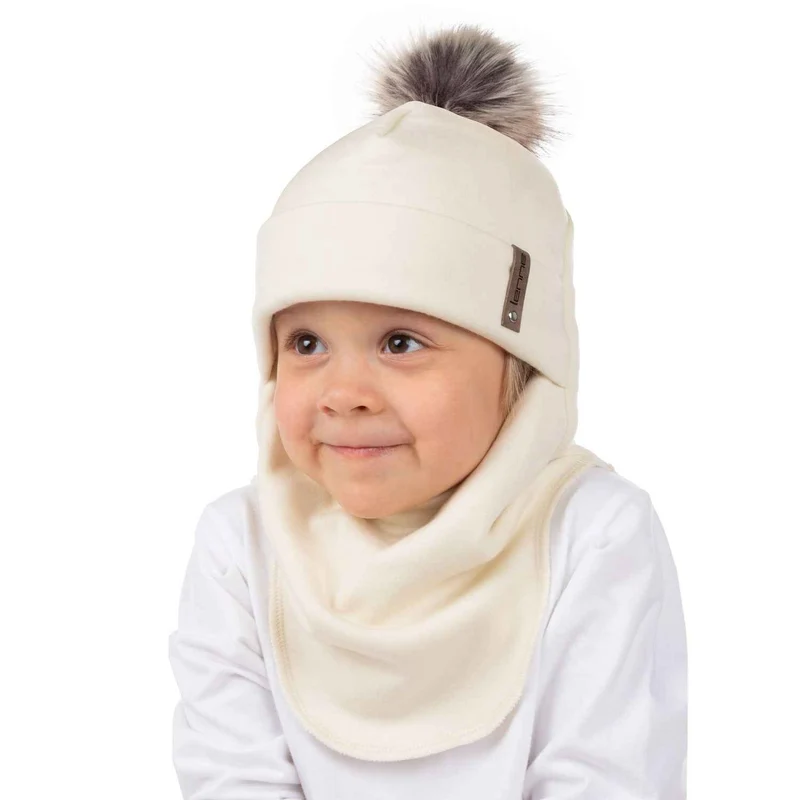 Blijf lekker warm met onze witte bivakmuts van merinowol - perfect voor avonturen in koud weer.