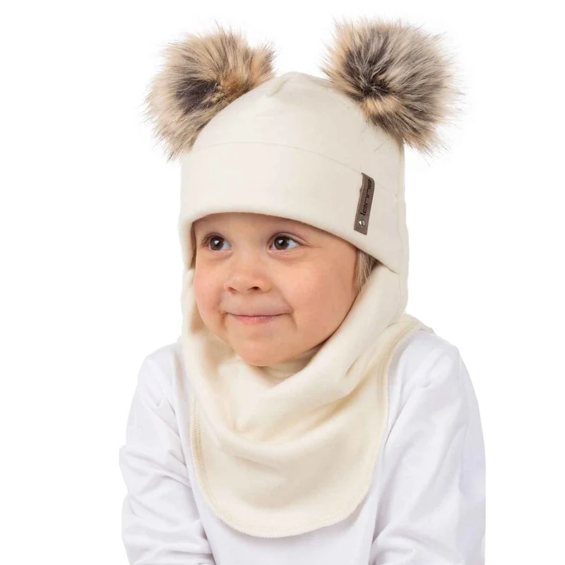 Blijf lekker warm met onze witte bivakmuts van merinowol: ultieme winterwarmte.