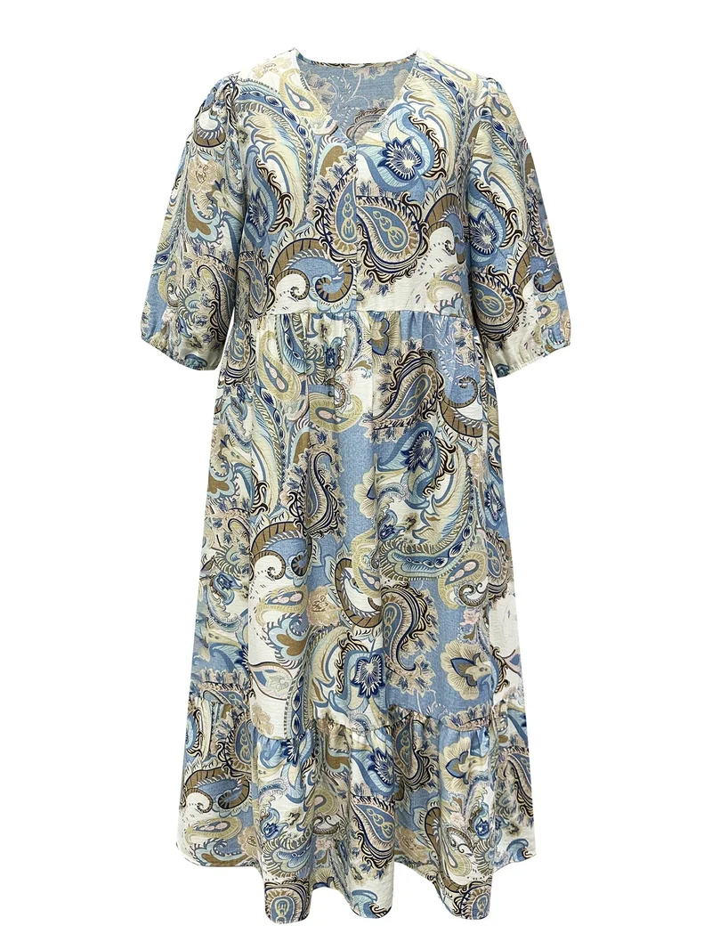 Ontdek comfort en stijl met onze plus-size jurk met V-hals en paisleyprint.